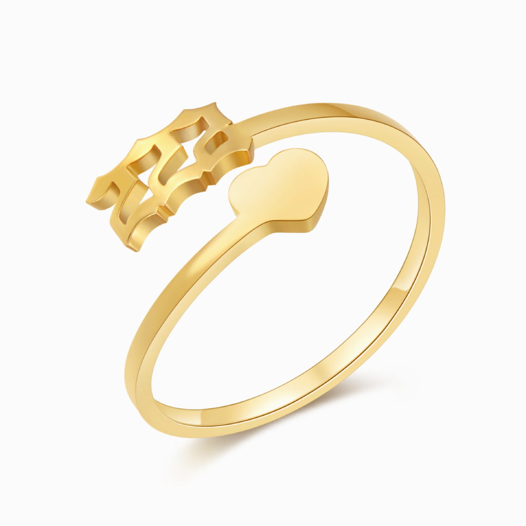 Gold angel number 222 and heart ring on a white background