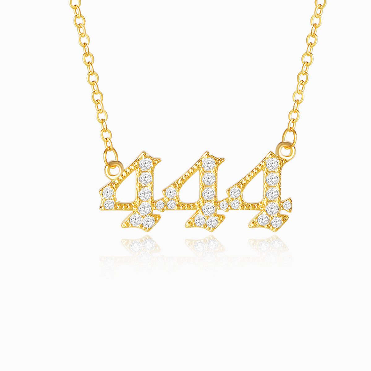 Gold necklace with angel number 444 pendant on a white background