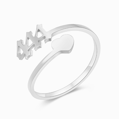 A silver ring with angel number 444 and a heart symbol on a white background