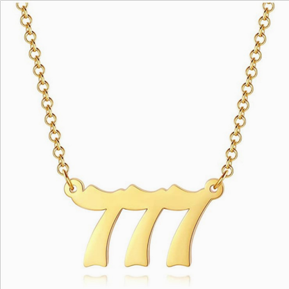 Gold chain necklace with old angel number 777 on white background