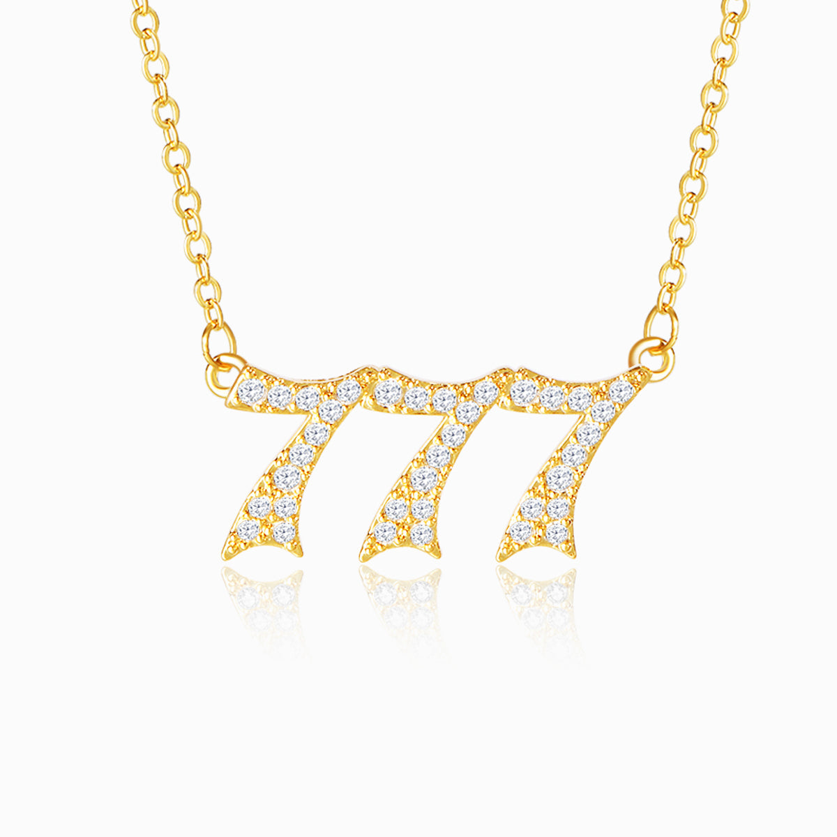 Gold chain with gold angel number 777 with white stones on white background