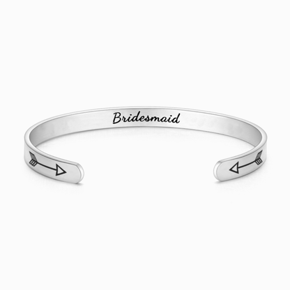 Silver bracelet with text engraving on white background