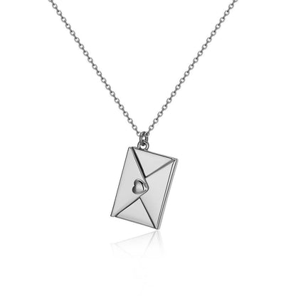 A silver chain necklace with an envelope-shaped pendant.