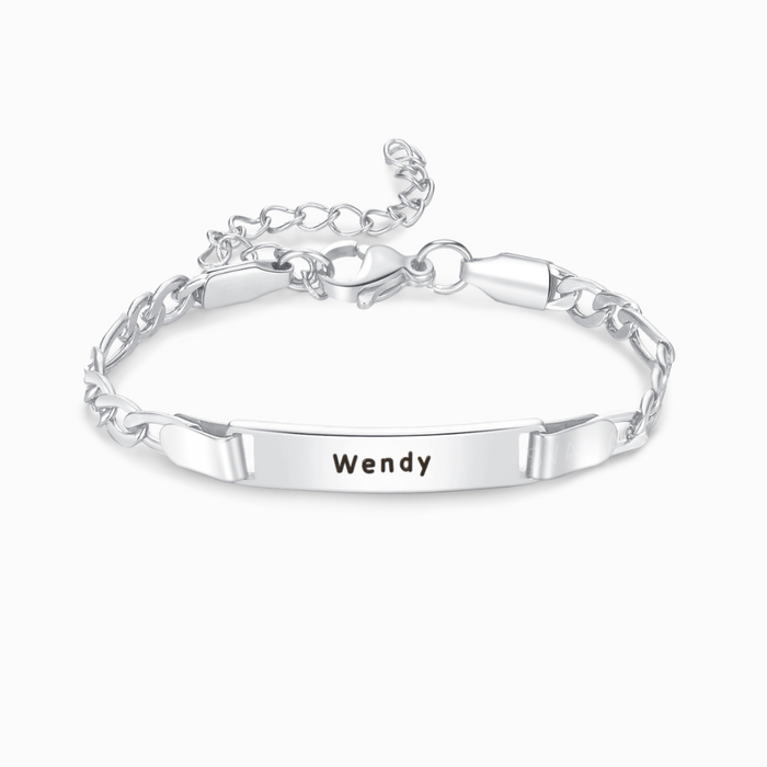 A silver plated personalized name bracelet on a white background