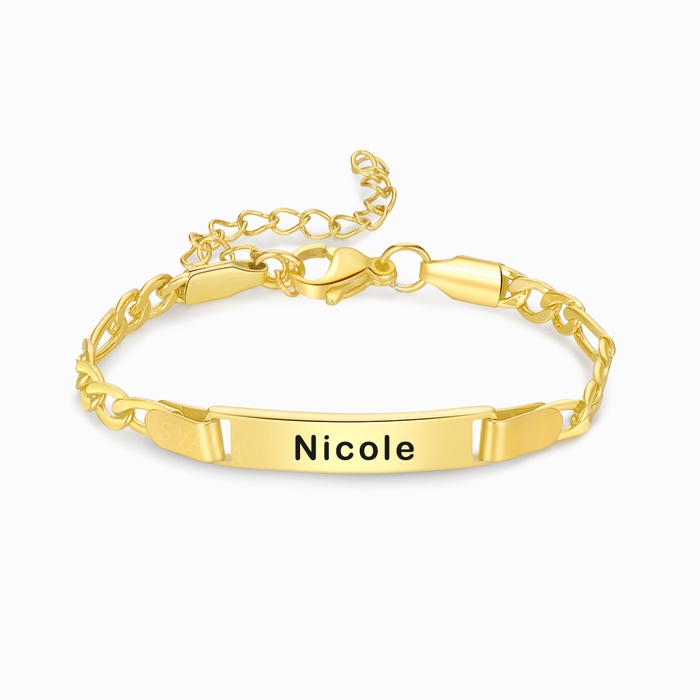 A gold plated personalized name bracelet on a white background