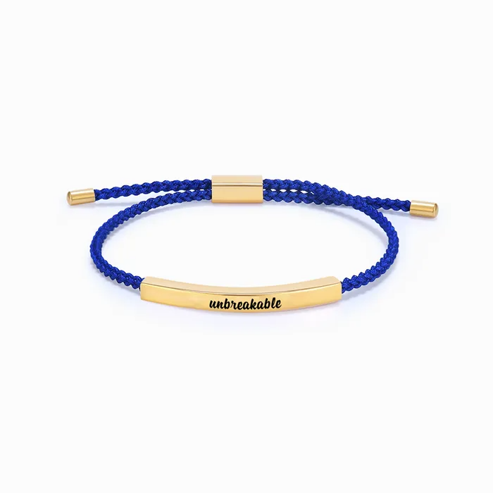 blue rope with gold bar with "unbreakable" text engraving on a white background