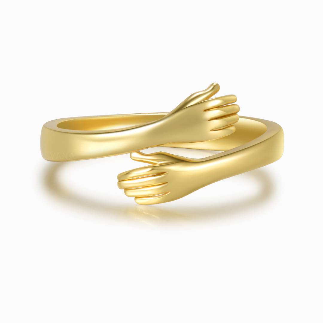 gold hug ring on a white background