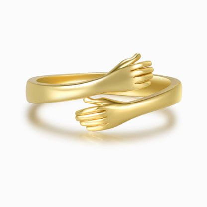 gold hug ring on a white background