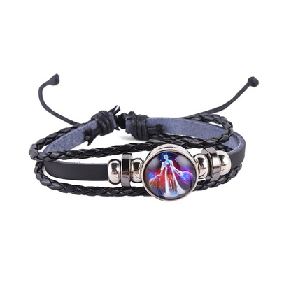 Black braided leather bracelet with a circle pendant that has a Virgo astrological symbol