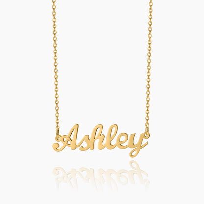 A gold chain necklace with a customized name pendant with a white background